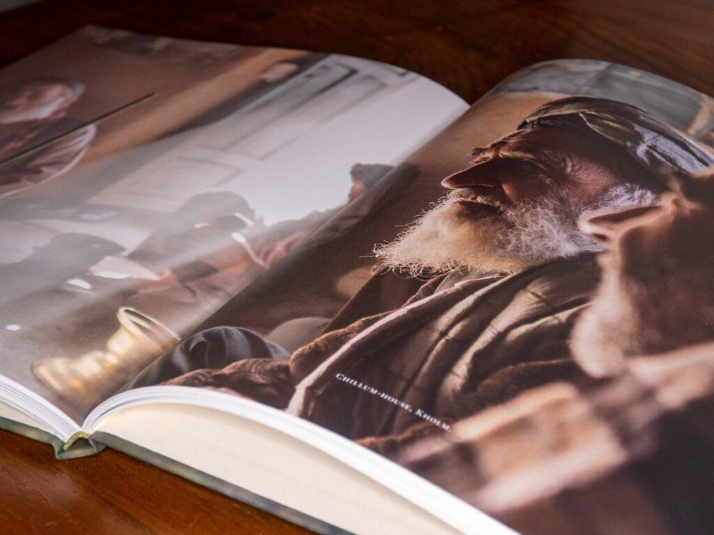 double page of the photo book afghanistan fortress of cannabis showing a picture in a chillum house.